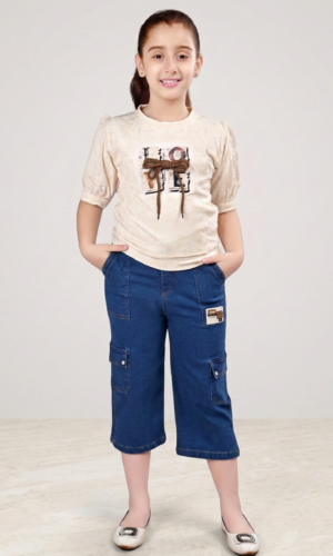 girl wearing cream puff sleeve top and blue denim cargo capri pants stylish kids outfit TrendWale