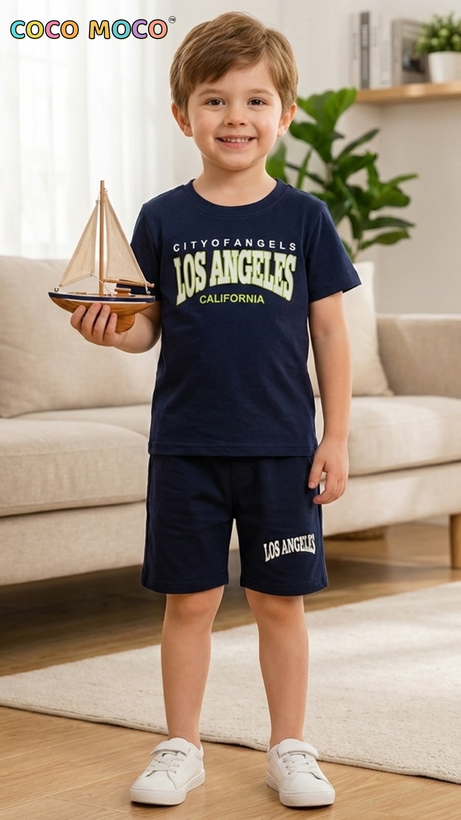 Boy in navy Los Angeles printed cotton t‑shirt and shorts set from TrendWale