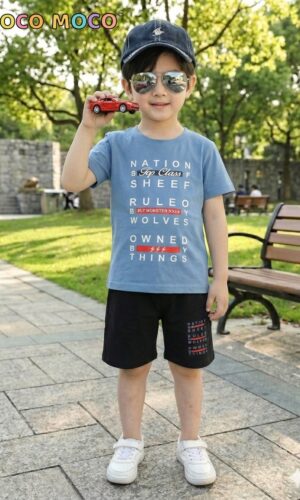 boy wearing blue cotton t-shirt with text print and black shorts kids casual outfit outdoor TrendWale