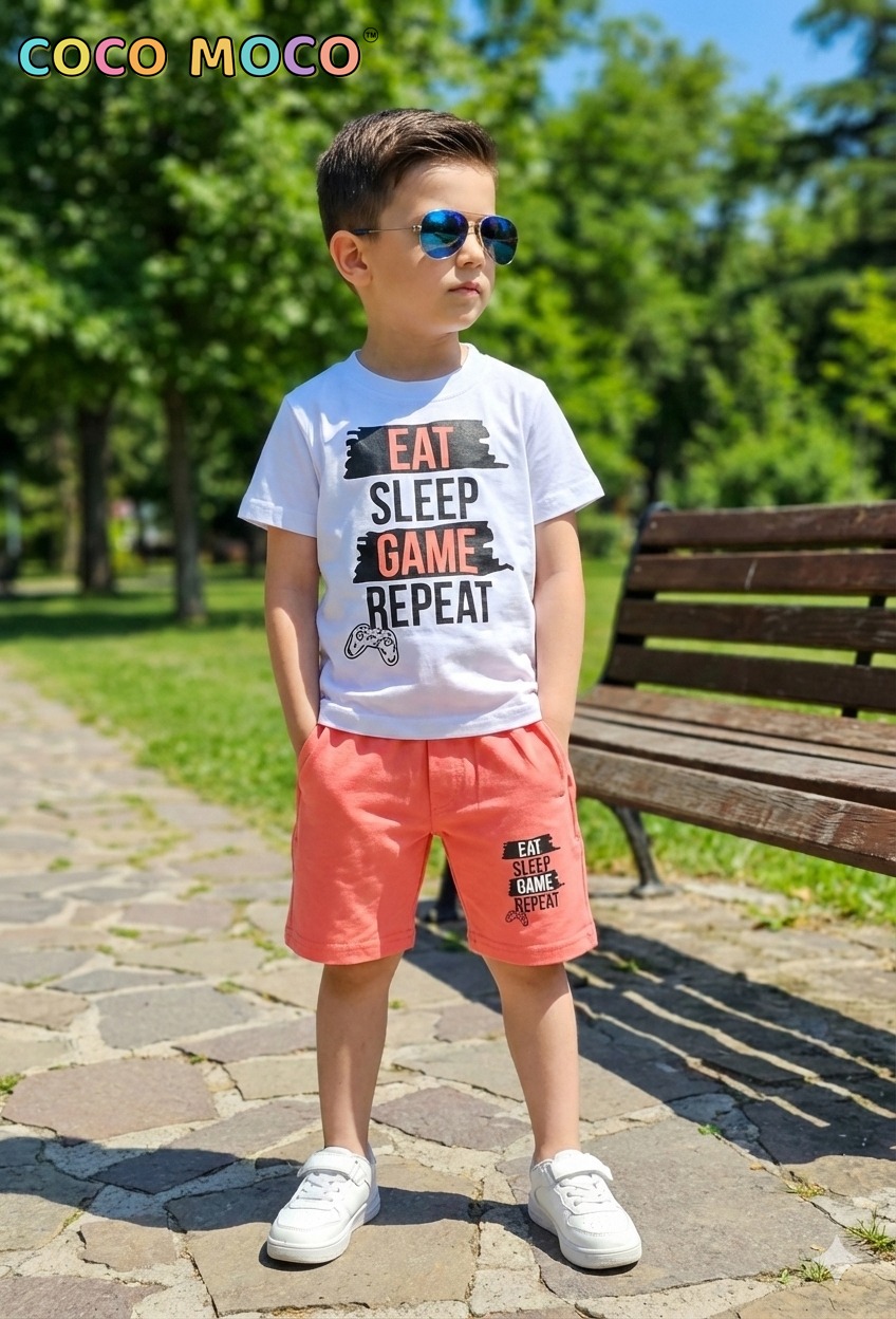 A young boy wearing TrendWale white gamer t-shirt and vibrant sunset orange cotton shorts.